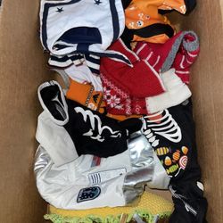 Box Of Dog Outfits 