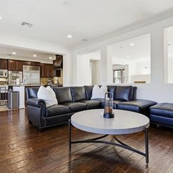 Black Leather Sectional Couch w/ottoman