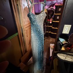 This item appears to be a sequin prom dress or evening gown featuring a teal and silver ombre gradient design, similar to styles from brands one of a 