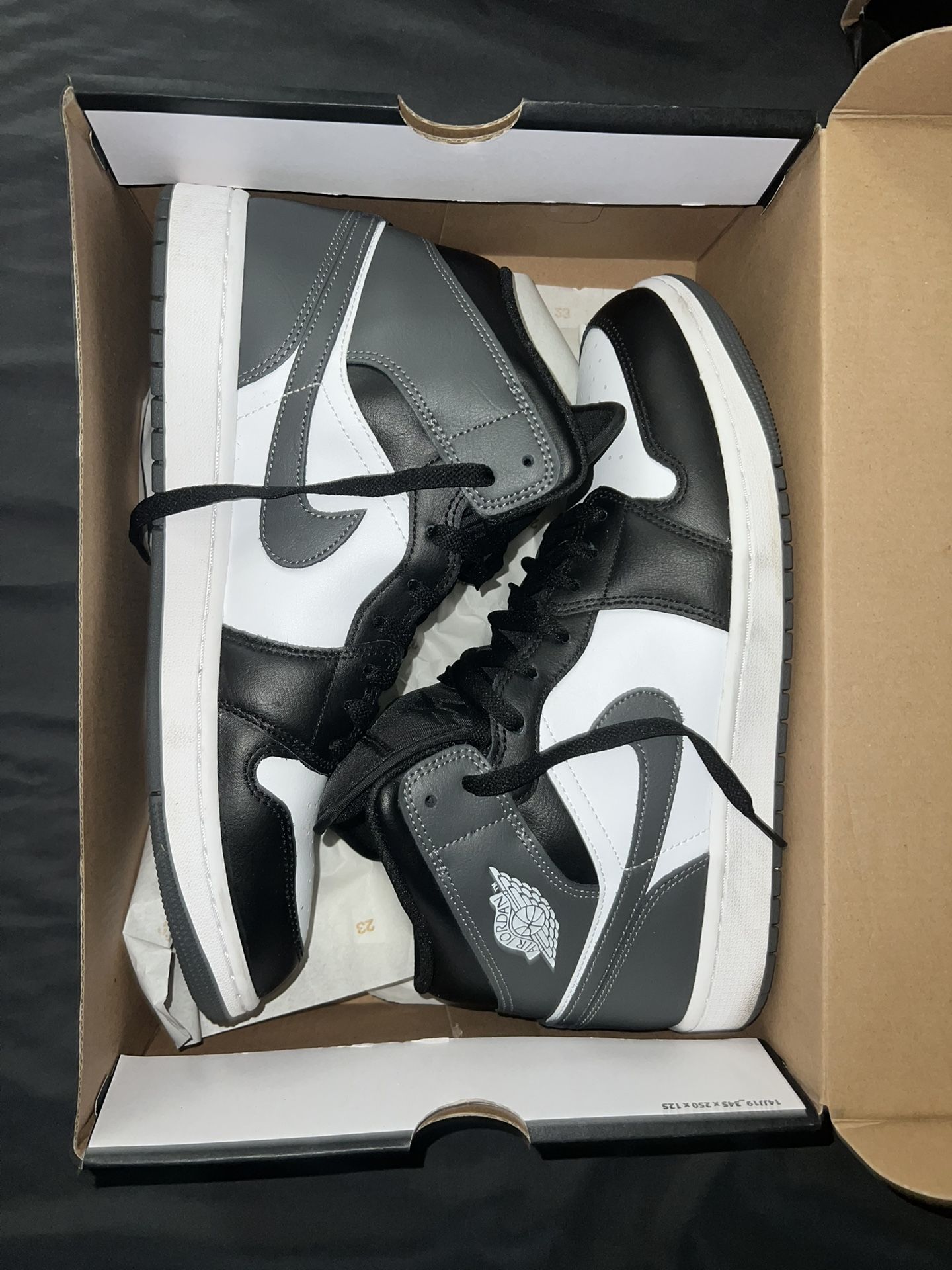2 Nike Men's Air Jordan 1 Mid Sneaker for sale.