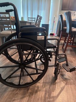 Lightweight Folding Wheelchair – Like New