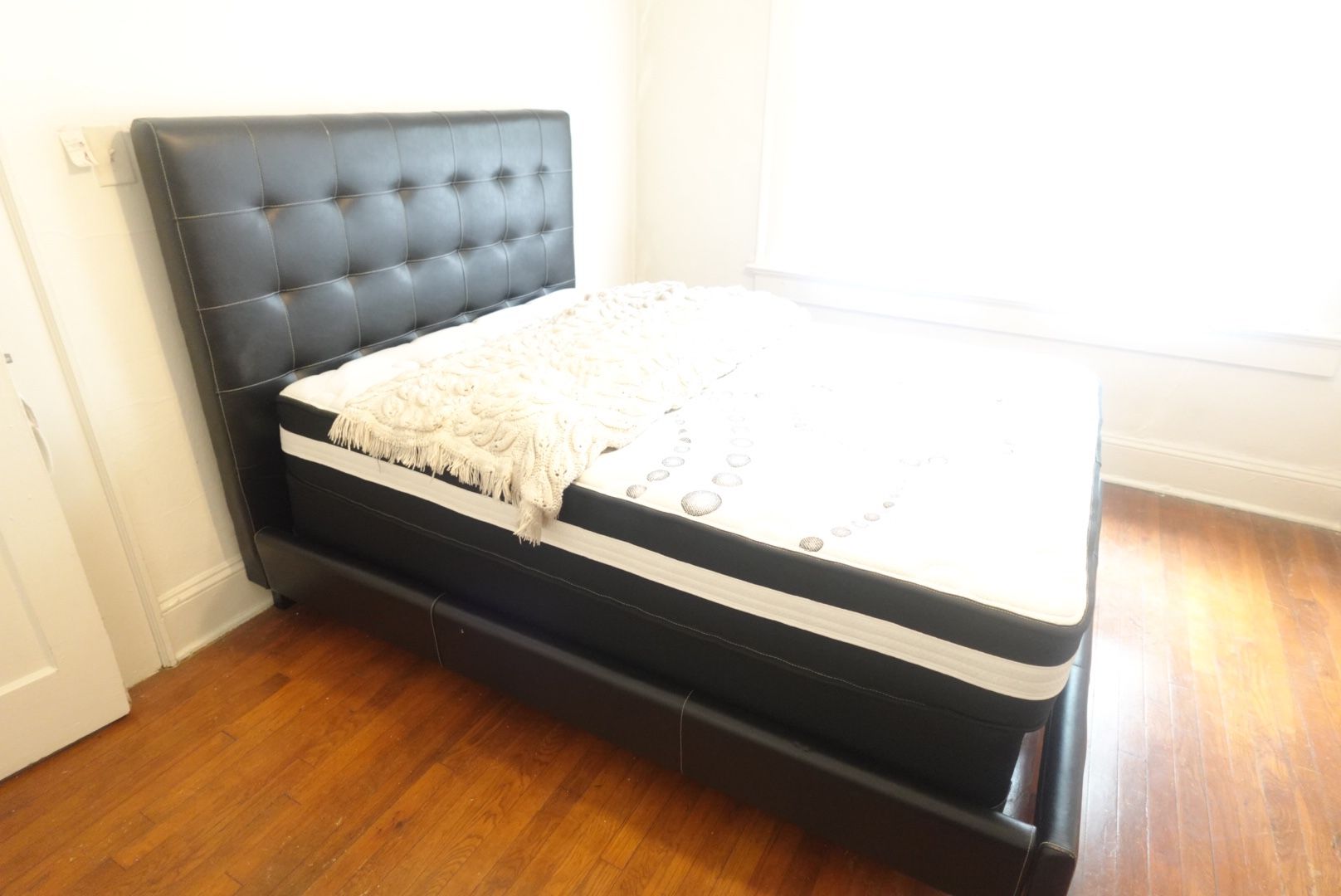 Black Queen Sized Faux Leather Bed Frame