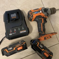 RIDGID BRUSHLESS HAMMER DRILL  With 2 Batteries And Charge 