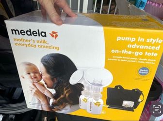 Medela pump with accessories