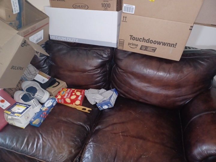 Leather couch first hundred dollars Takes it.Bring Muscle to move it 