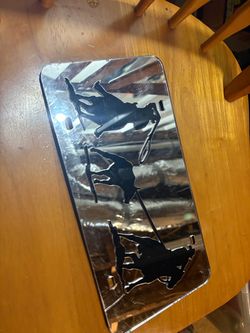 Chrome car tag.