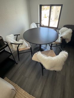 Round Black Dinning Table & Mid Century weave metal dining Chairs