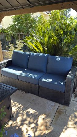 Outdoor Wicker Patio Sofa with Blue Cushions