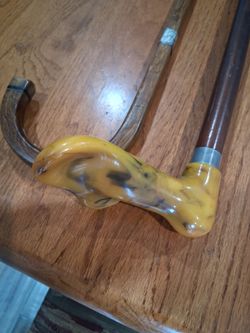 Vintage Walking Canes. 1 Bakelite and 1 Animal Bone and Sterling Silver wrap. $20.00 Each.  Price Firm