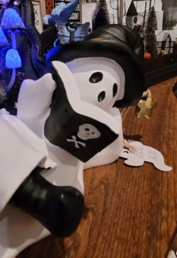 Goblin & Ghoul  reading ghost with witch hat