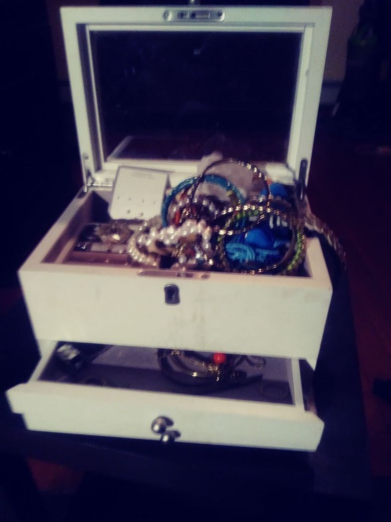 White jewelry box with jewelry too