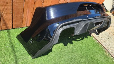 2018 - 2023 FORD MUSTANG GT REAR BUMPER COVER W/ HOLE SENSORS GENUINE USED OEM.