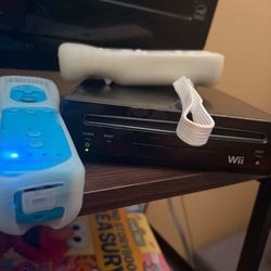 Wii with controllers and cords