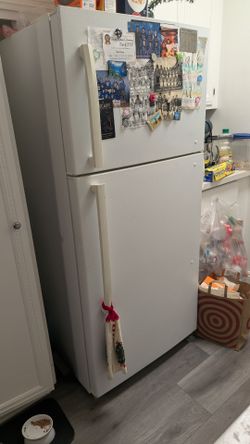 Insignia Use Refrigerator 67 once tall, 36 inches  wide , 30 inches deep...7 years old but still runs really good