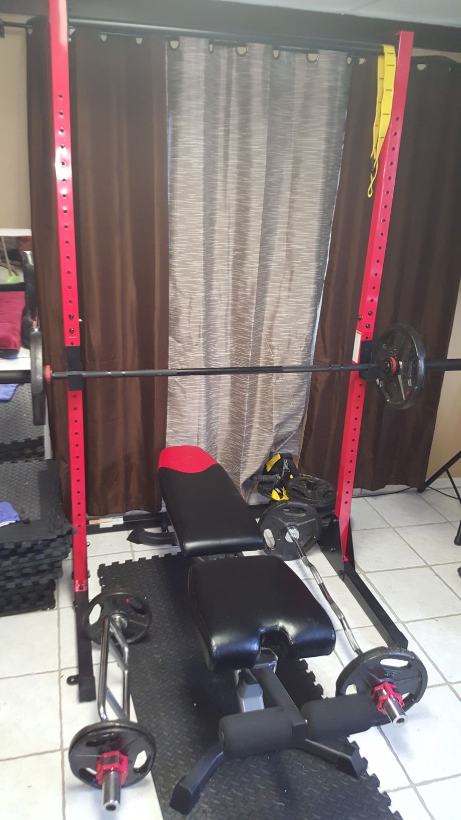 Bowflex weight bench, tower, Olympic bars and weights.