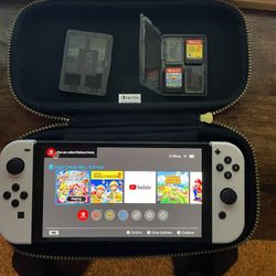 OLED Nintendo Switch With Case And Two Games 