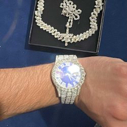 Watch and two chains with so an rosary 