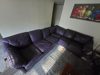 Large L shape purple leather couch