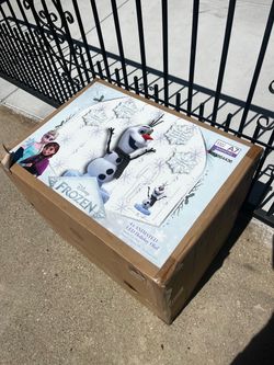 Frozen Olaf holiday statue