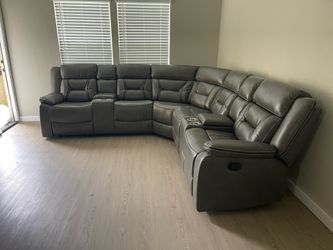 Grey Leather Sectional with Reclining Seats + Storage consoles + Cup Holders
