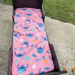 Used- In good condition- Delta Children MySize Wood Toddler Bed - With mattress and cover sheet at no extra cost - Includes 