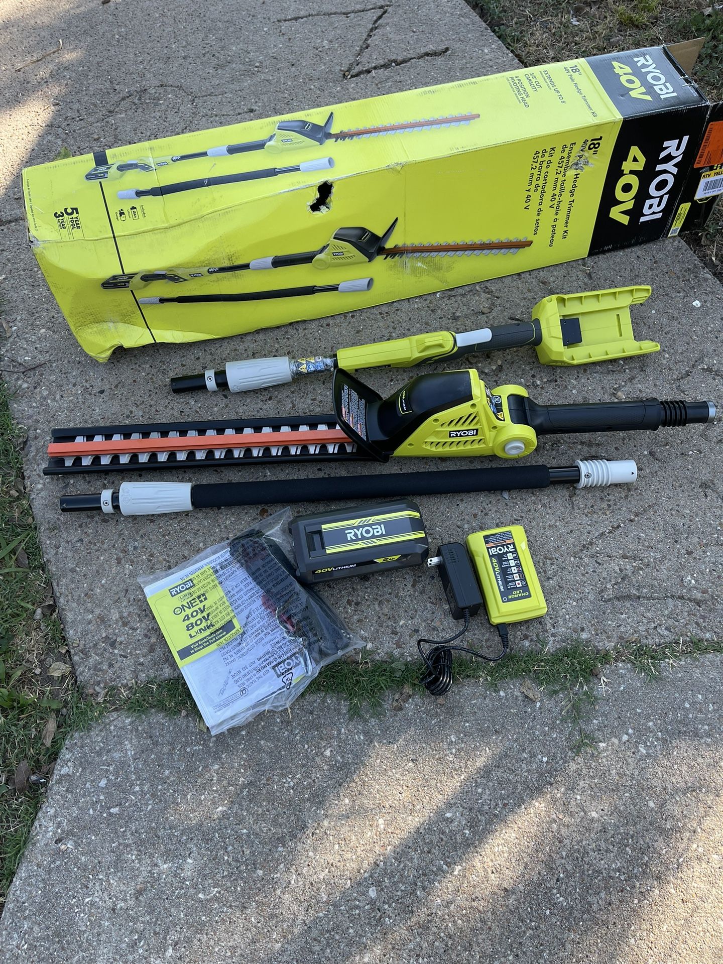 RYOBI 40V 18 in. Cordless Battery Pole Hedge Trimmer with 2.0 Ah Battery and Charger