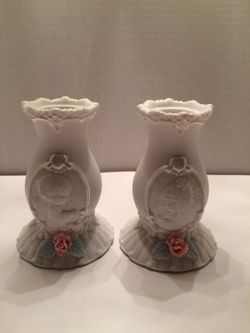 A pair Precious moments candle holder