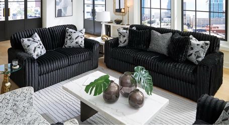 Luxury cloud black plush Ashely furniture sofa and love seat