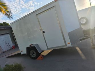 White Enclosed Cargo Trailer with Ramp