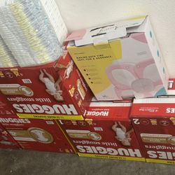 7 Boxes Of Size One Diapers 