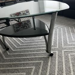 GLASS COFFEE TABLE (on Wheels) By Ashley 