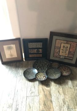 4 wall decor 3 frames and one round decor