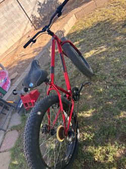 Mongoose Hitch Mens All-Terrain Fat Tire Mountain Bike, 7 Speed Drivetrain, 26-inch Wheels, 4-Inch Wide Tires, Front and Rear Disc Brakes, Red