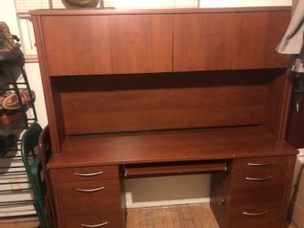 Desk with credenza and computer keypad pull out . Two years old in good condition.