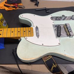 Guitar Restring And Setup Services.