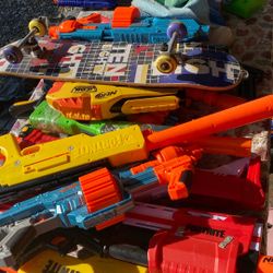 Nerf, guns and skateboard