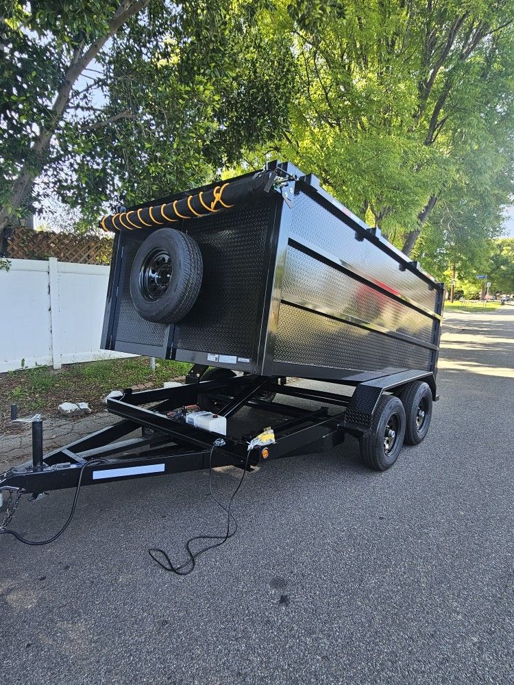 BRAND NEW DUMP TRAILER 8X12X4 12,000 LBS ROLLING TARP AND SPARE TIRE HYDRAULIC SYSTEM ELECTRIC BRAKES TITLE IN HAND FOR ANY QUESTION TEXT ME PLEASE