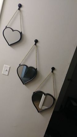 Heart-shaped hanging mirrors beautiful accent for a hallway or an empty space