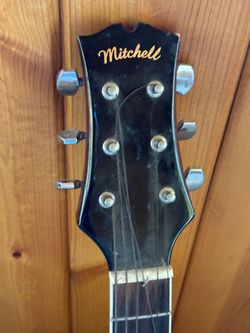Mitchell Child’s size guitar