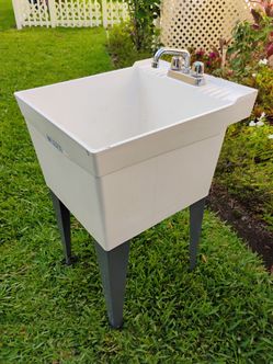 Utilatub utility indoor outdoor wash sink with faucet. 33H 20 W 23D