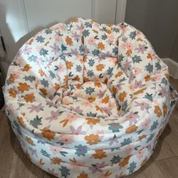 Settle in Kids' Bean Bag Chair Floral Print - Pillowfort Multicolored, Double-Stitched, Handle & Pocket, Ages 3-9