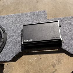 2- 12” Kicker Comp VR with custom box and Kicker Amp