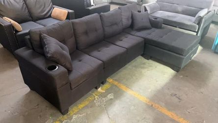 BRAND NEW L SHAPE SECTIONAL COUCH WITH CUP HOLDERS