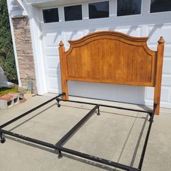 Beautiful King Size Solid Wood Headboard attached to a King size metal bed frame