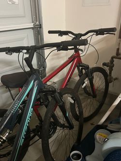 Two Mountain Bikes – Red and Blue/Teal