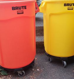 (2×) Two Rubbermaid trash w/ dolly base (new/used)