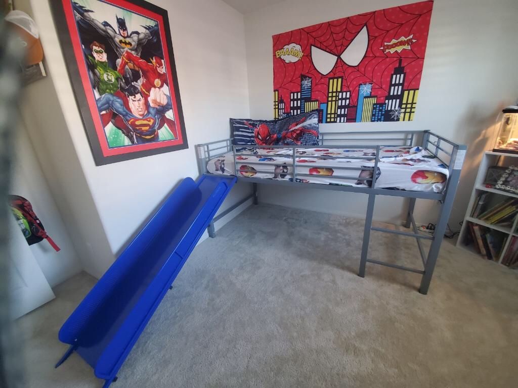 Twin bed frame with slide