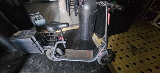 Skute Electric Scooter with Seat and Basket