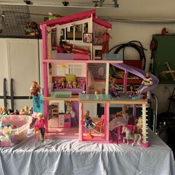 Barbies And Barbie House. 