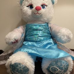 Build a Bear Elsa Disney Frozen Sparkly Blue 18" Plush with Dress. It is in very respectable pre owned condition ready to bring a special someone tons